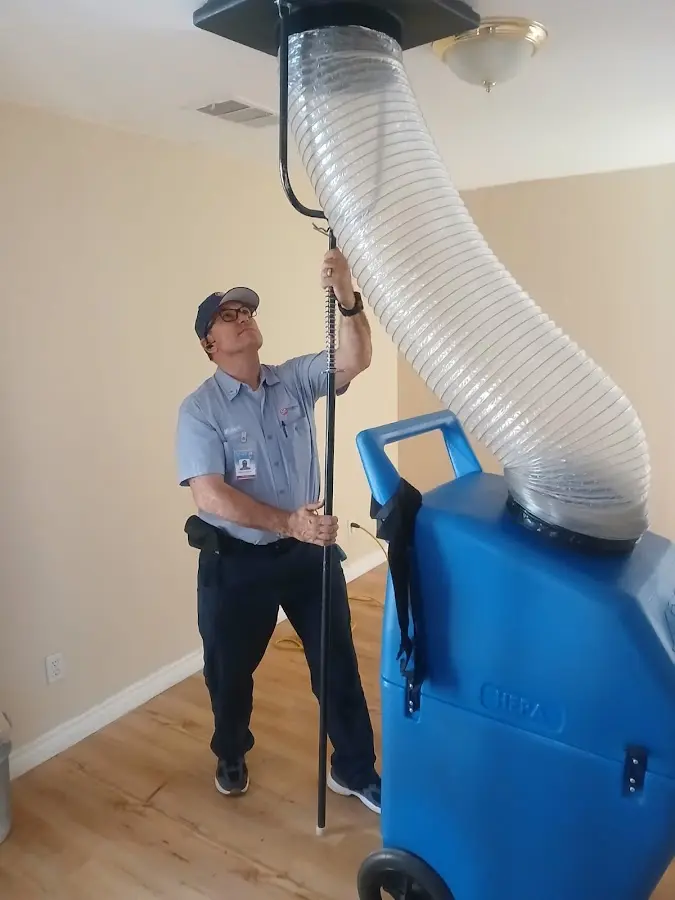 Mini Split Installation technician using HEPA equipment in Sioux Center